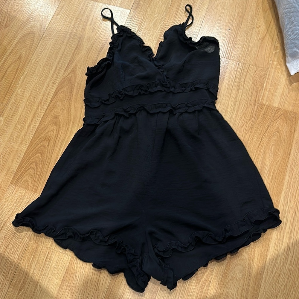 Black ruffle romper